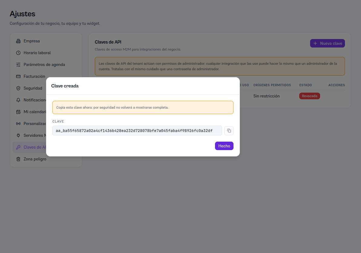 Modal «Clave creada» de una clave de empresa con el aviso de mostrar una sola vez y el campo Clave con el valor completo empezando por aa_
